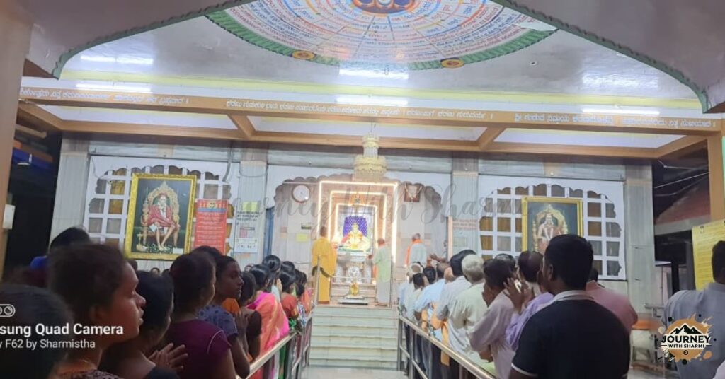 Evening Aarti at Siddharoodha Swamy Math Hubli, where devotees gather for prayers, lamps, and spiritual chants.