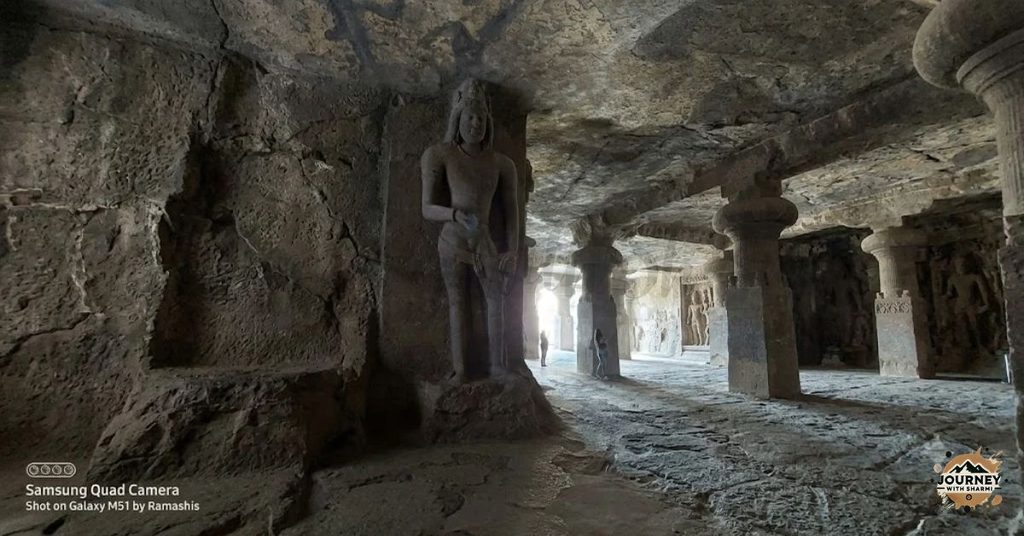 Exploring the dim, pillared corridors and timeless stone architecture of the Elephanta Caves.
