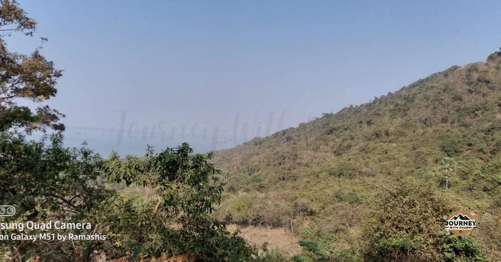 Lush, Tree-Covered Slopes, Gharapuri Island.