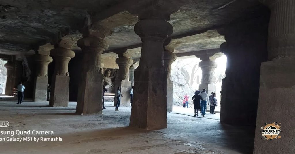 The Grandeur of Massive Rock-Cut Pillars Standing Tall within the Ancient Shrine Halls.